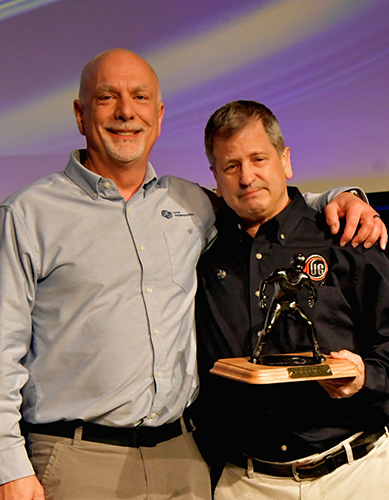 Paul Bates (left) had the honor of presenting his friend and colleague Gary Rabinovitz with AMUG's Lifetime Achievement Award.